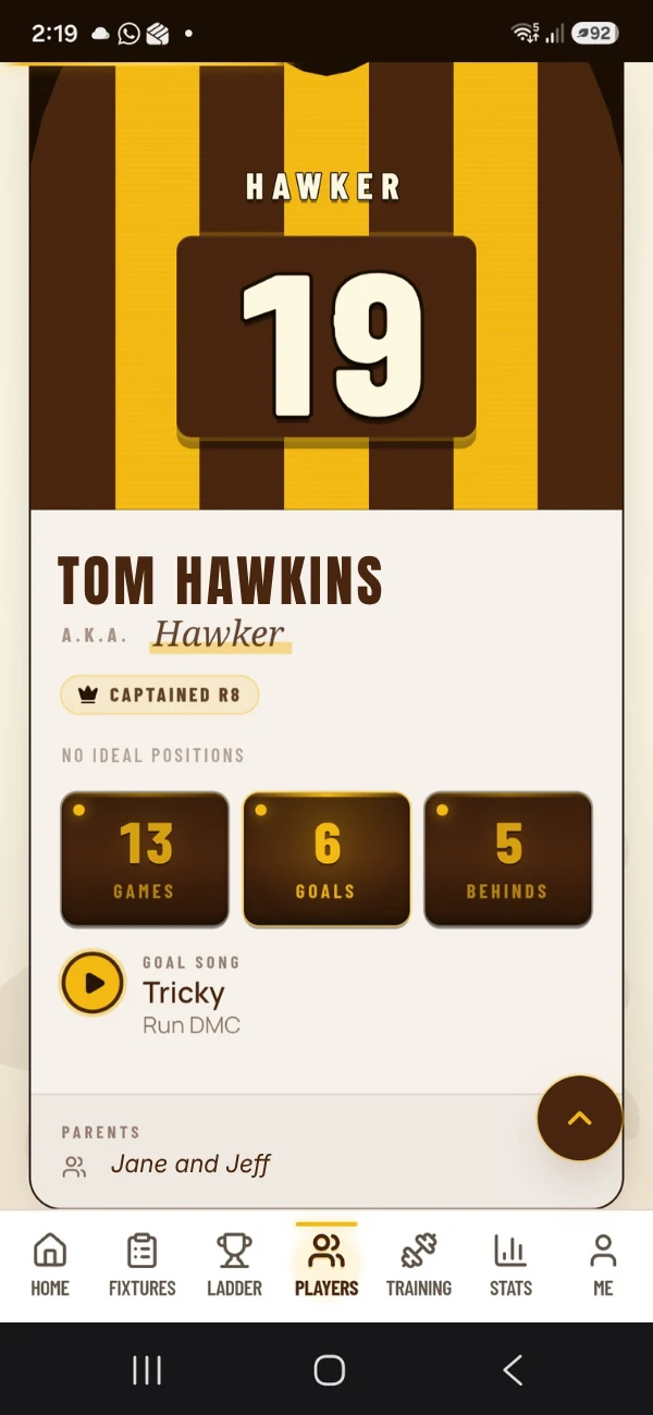 The app on a phone: a player profile with the season counts and the player's goal song